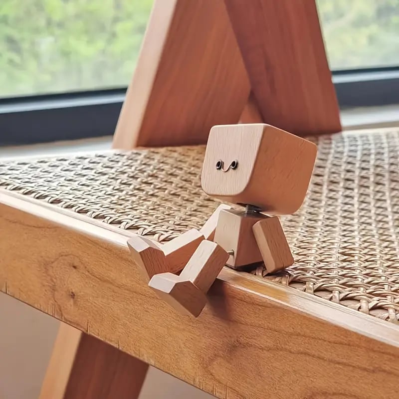 Charmig liten träfigur som kan rör sig med 12 magnetiska ansiktsuttryck